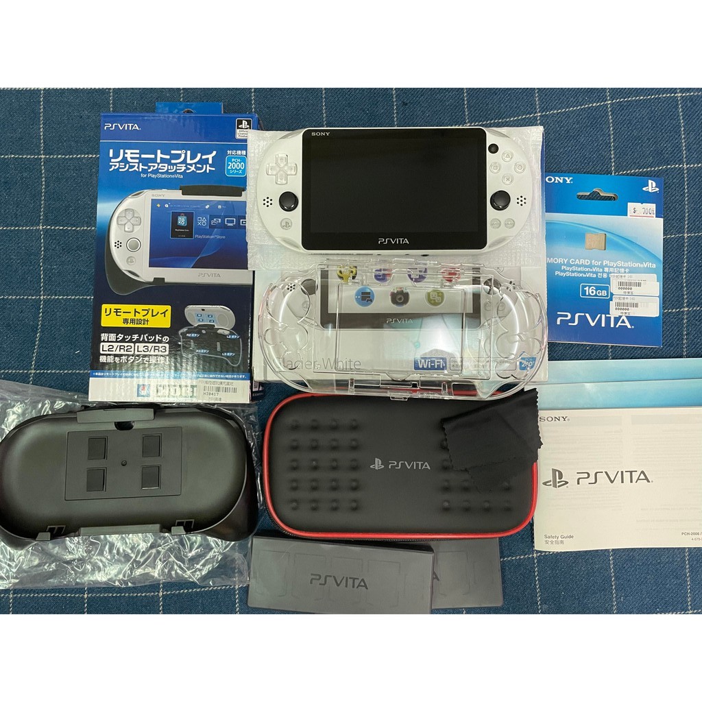 二手 九成新 PS Vita主機 白色 (含主機透明保護殼、小包包)