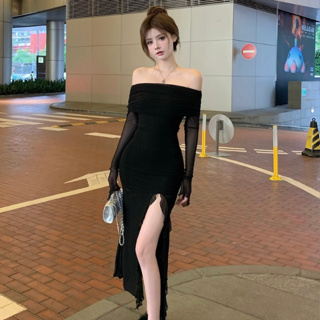 韓版時尚性感緊身長裙女裝緊身收腰一字領長袖不規則包臀高腰中長款黑色開叉洋裝
