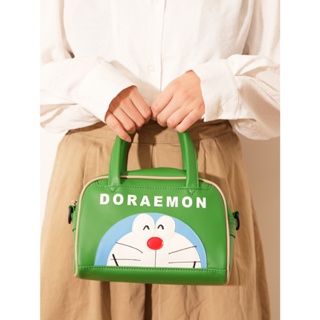 日本卡通哆啦A夢大容量手提袋 可愛機器貓斜背包 小叮噹時尚PU斜背包