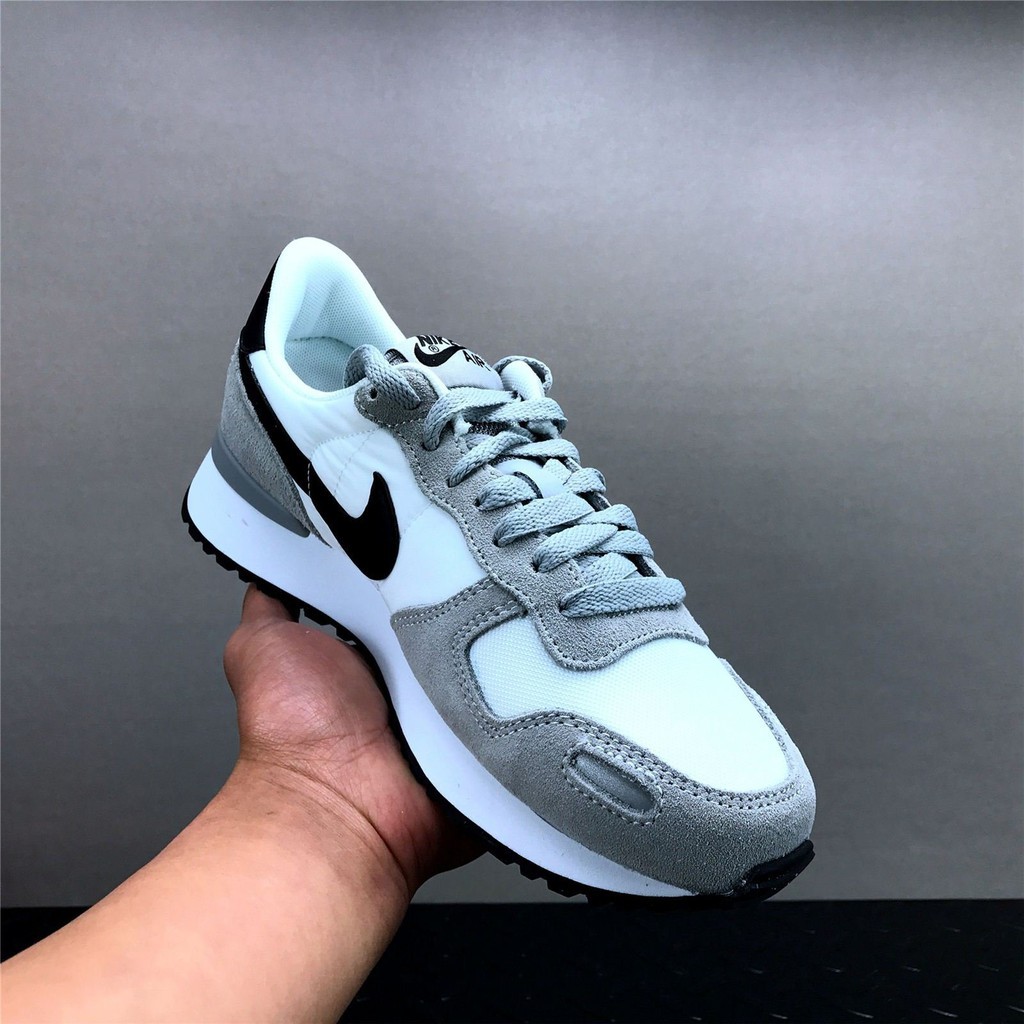 grey nike air vortex