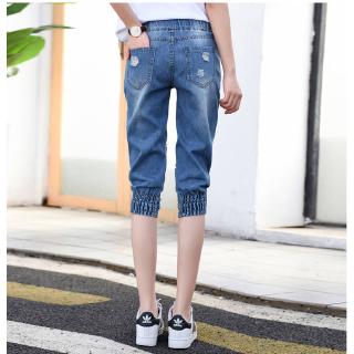 現貨 破洞牛仔七分褲女70kg可穿松緊腰七分褲女夏季新款寬松韓版大碼薄款哈倫褲磨白束腳中褲现货七分牛仔裤女