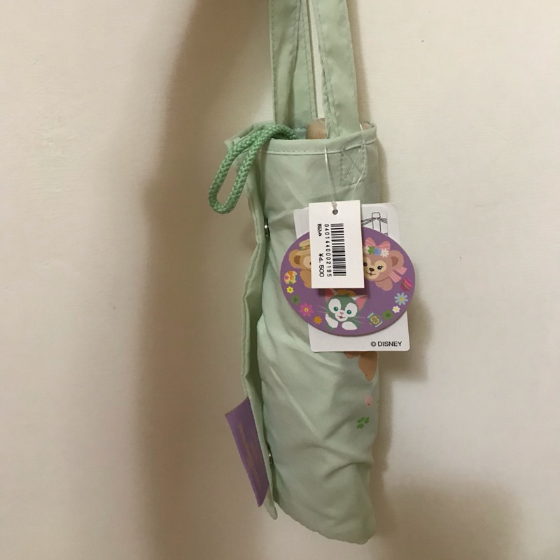 現貨～東京迪士尼帶回達菲雪莉梅畫家貓晴雨折疊傘，全新未使用，但提袋部分畫家貓有微黑色髒污～原價日幣4500～降價出售！