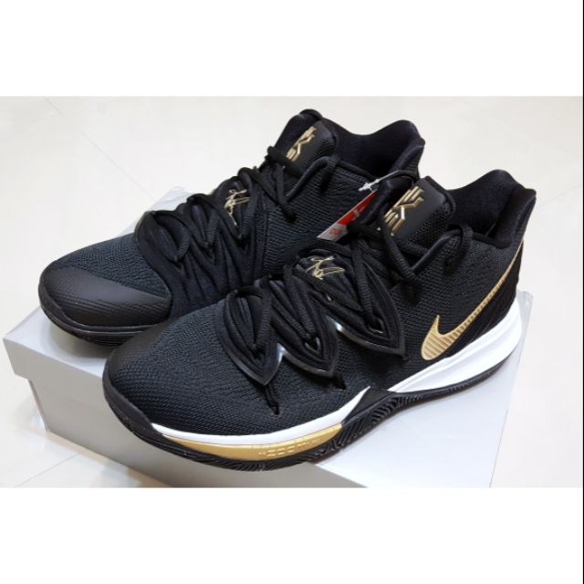 gold and black kyrie 5