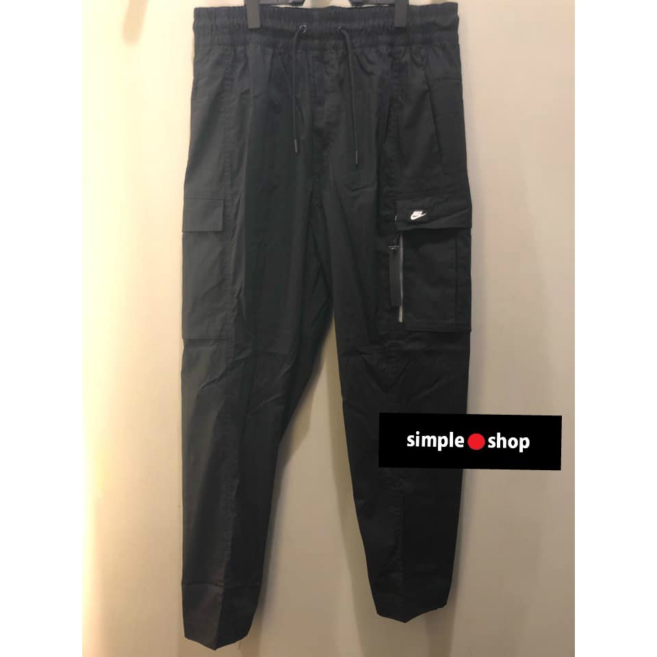 【Simple Shop】NIKE 抽繩 拉鍊 運動 長褲 工作褲 彈性 窄管 多口袋 九分 黑 BV3128-010
