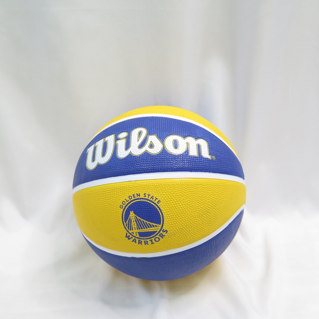 WILSON 維爾遜 NBA隊徽系列 七號籃球 勇士 橡膠 室外 WTB1300XBGOL 藍黃【iSport商城】