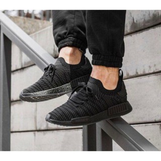 triple black nmd stlt