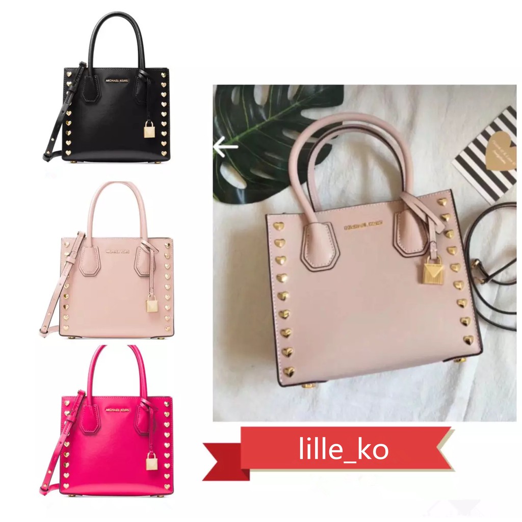 mk mercer pink and white