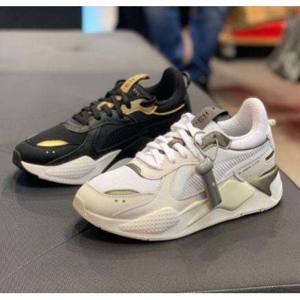 puma rsx trophy black gold