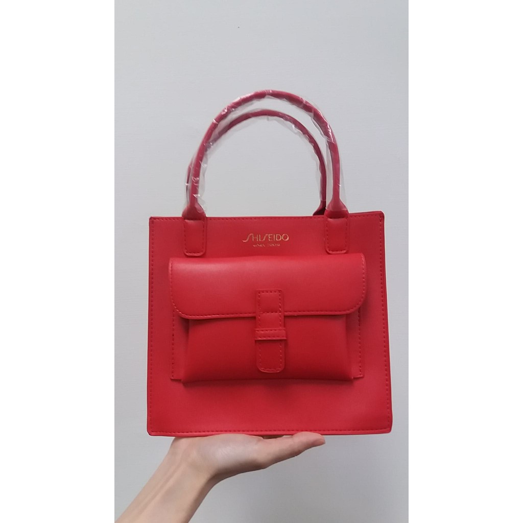 名古屋的店 Shiseido 資生堂紅色質感手提包 公司貨 附防塵袋 蝦皮購物