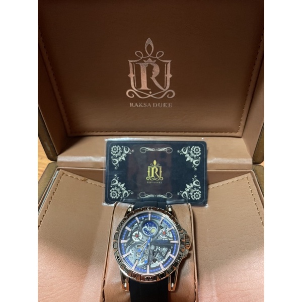 蘇格蘭皇家品牌 RAKSA DUKE羅薩公爵 日月星辰自動上鍊機械黑底藍紋膠帶腕錶