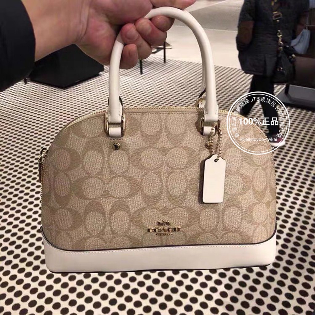 coach alma mini