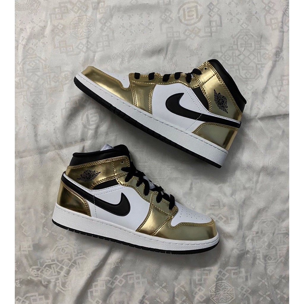 nike mid gold