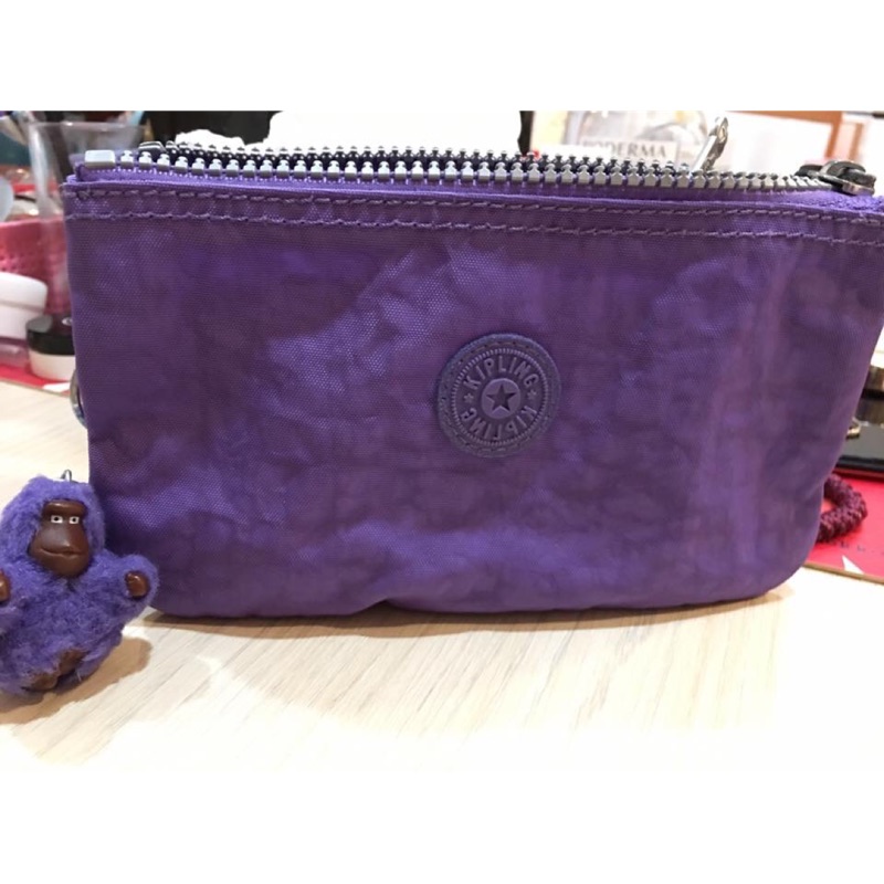專櫃正品Kipling 紫色多功能三層手拿包 手機包 二手近新 現貨
