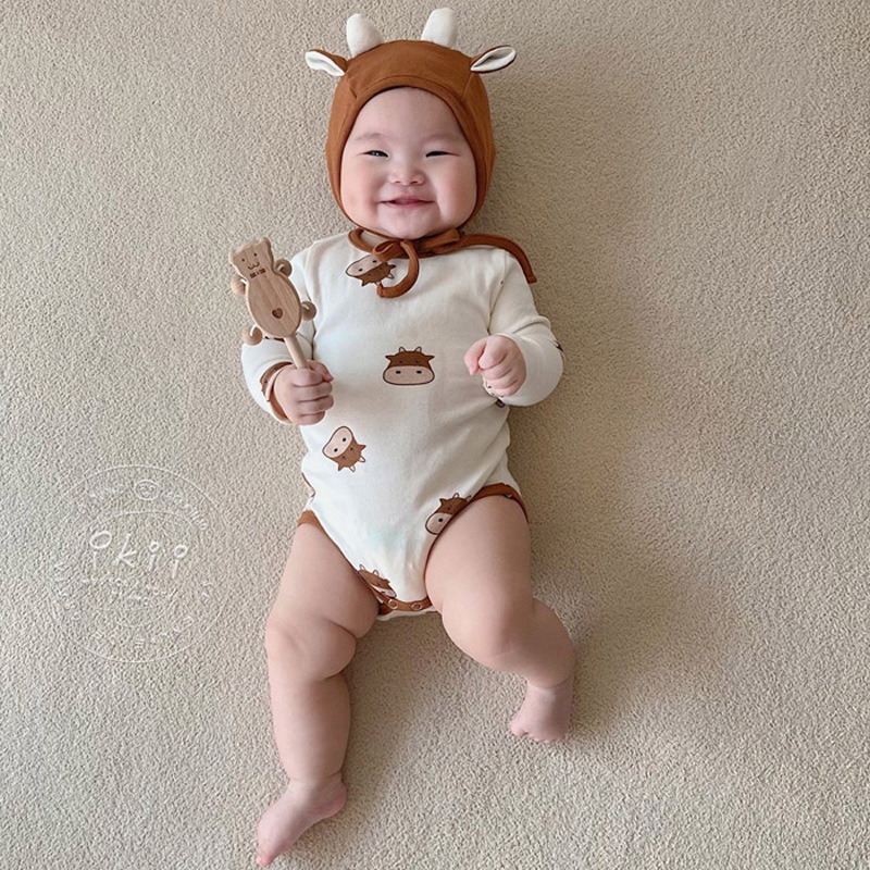 男女寶寶韓版新生嬰兒奶牛三角連體哈衣滿月可愛凸造型爬服