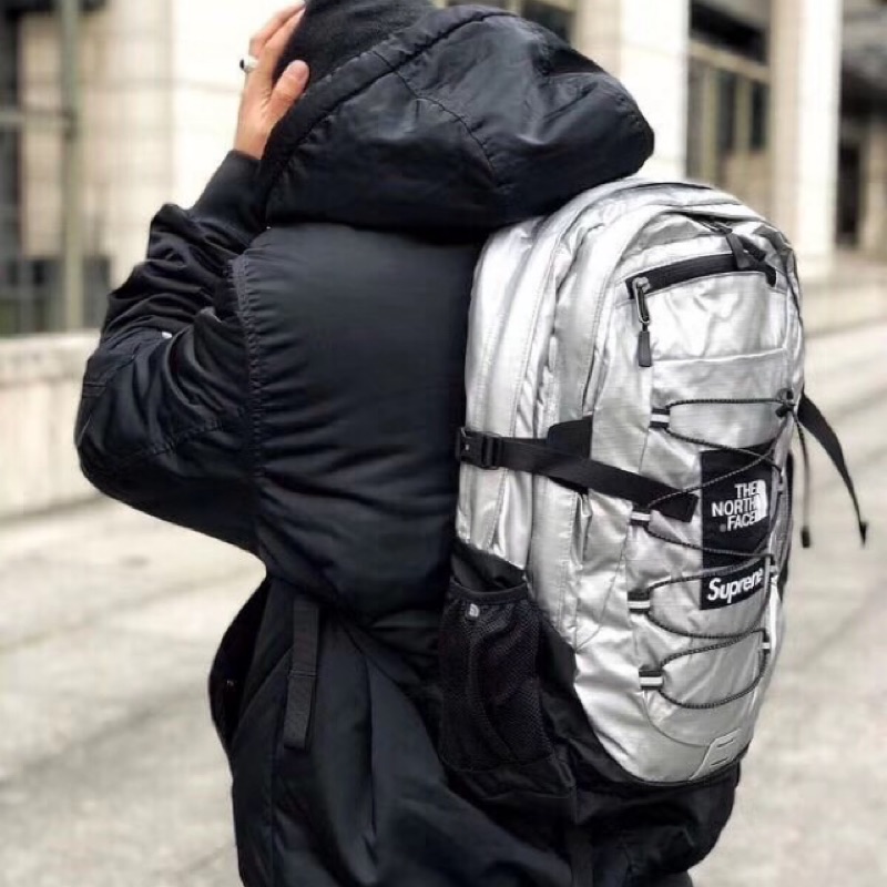supreme north face backpack silver