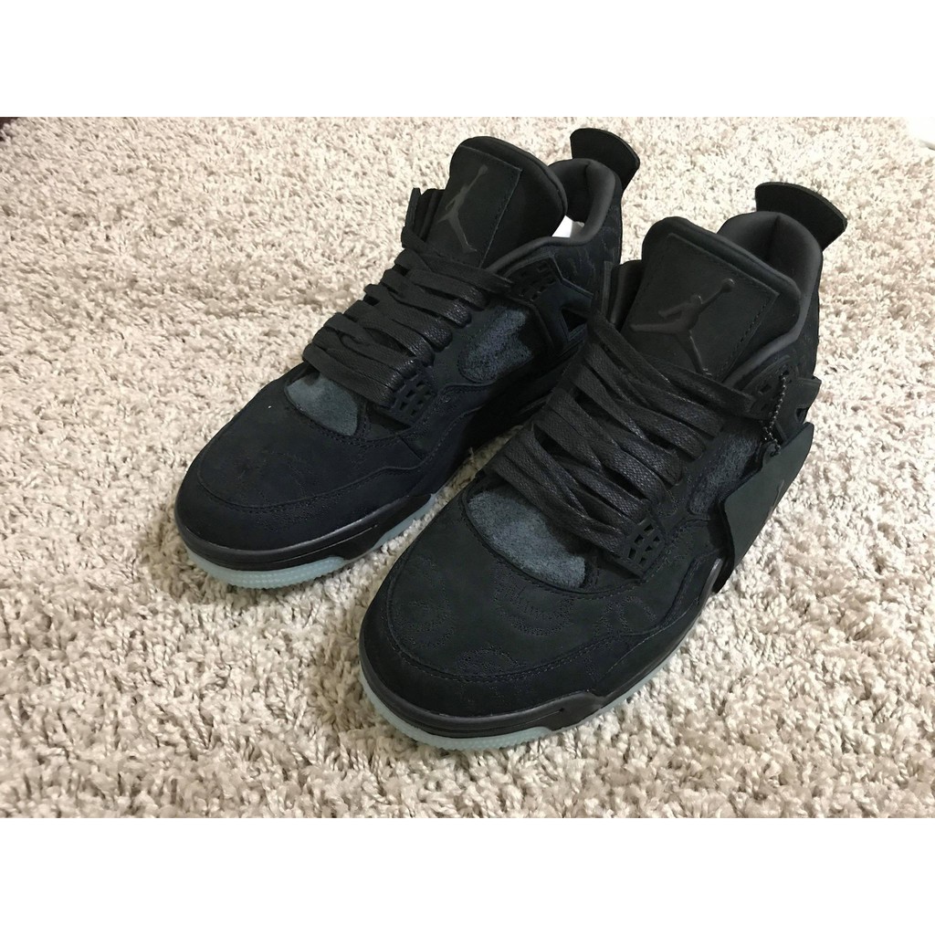 fake kaws jordan 4