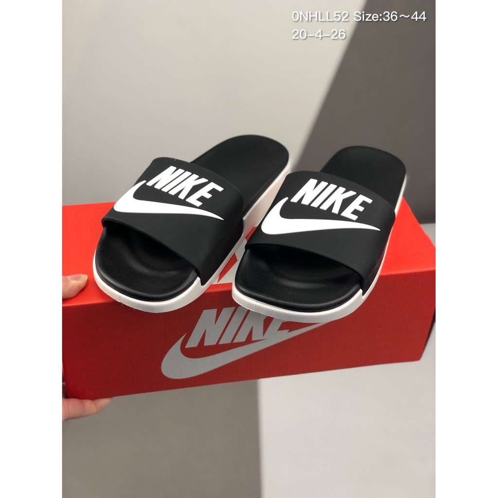 nike benassi mismatch slides