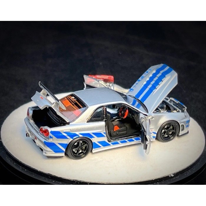 PGM X ONE 型號 1:64 NISSAN SKYLINE R34 NISMO Z-True 速度狂暴銀藍色