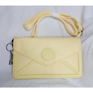❤0927❤現貨【機場免稅店購入】Kipling 凱普林 粉嫩香蕉奶油色信封型肩背小包 NEW LELIO 斜背包