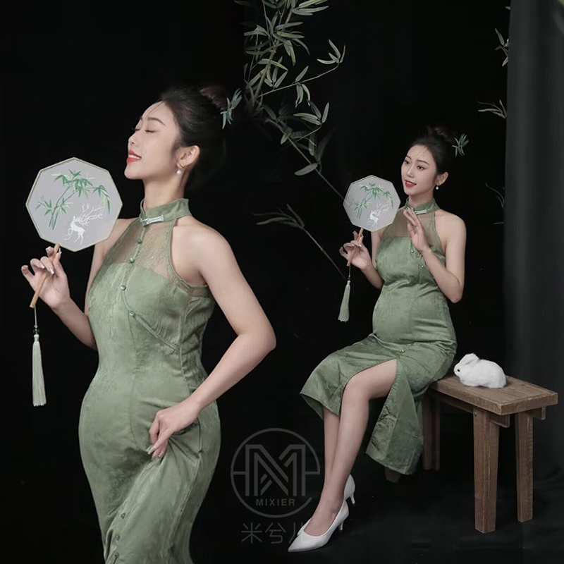 2077影樓孕婦拍照攝影寫真主題服裝新中式復古綠色蕾絲旗袍出租