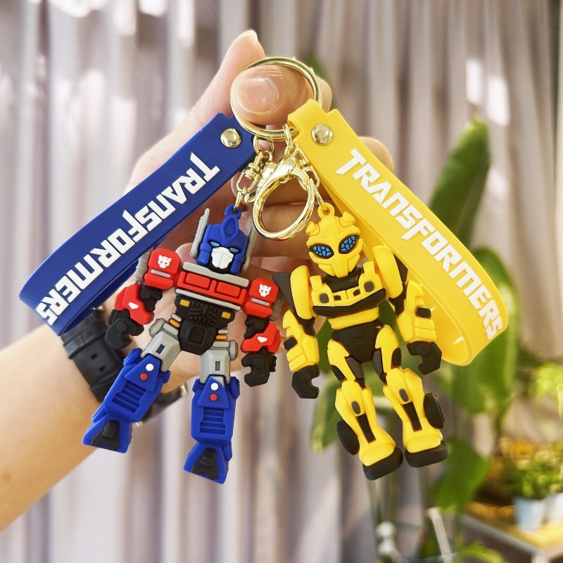 TRANSFORMERS 變形金剛擎天柱大黃蜂鑰匙扣三維公仔背包挂件兒童動漫機器人矽膠玩具