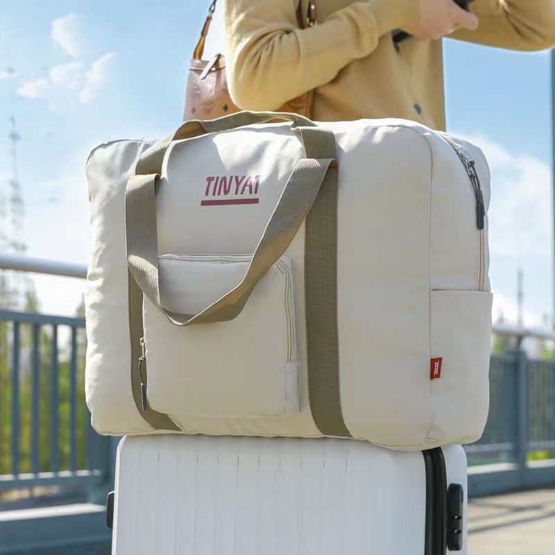 【挑戰全網最低價】男士出差旅行包學生帆布住宿行李包輕便旅行可套拉桿包折疊搬家袋