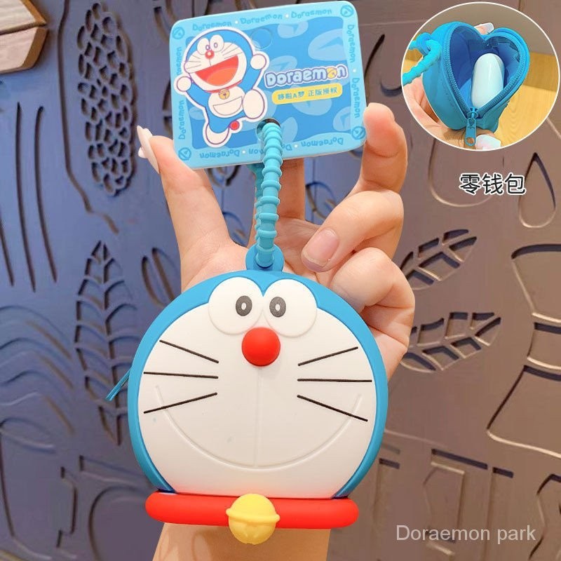 正版哆啦A夢零錢包鑰匙包小機器貓耳機收納包創意可愛迷你小包包