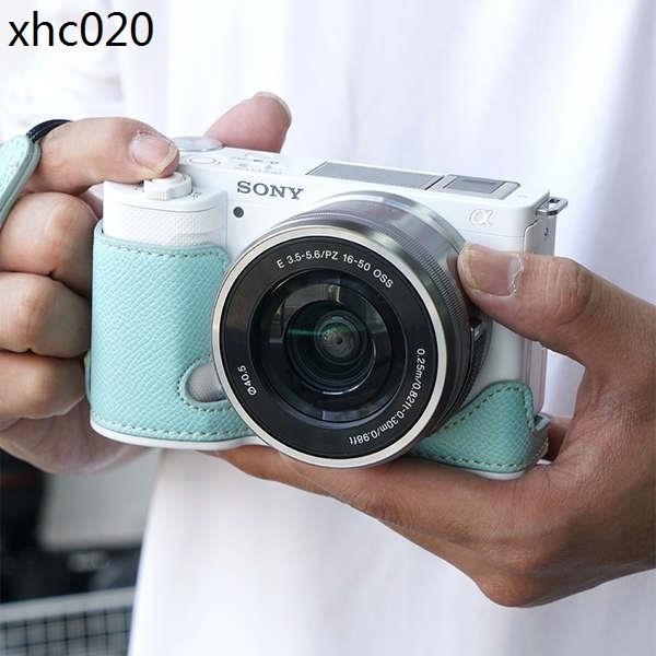熱賣. 適用於索尼ZVE10 ZV-E10相機包保護套 zve10半套便攜底座zve10l