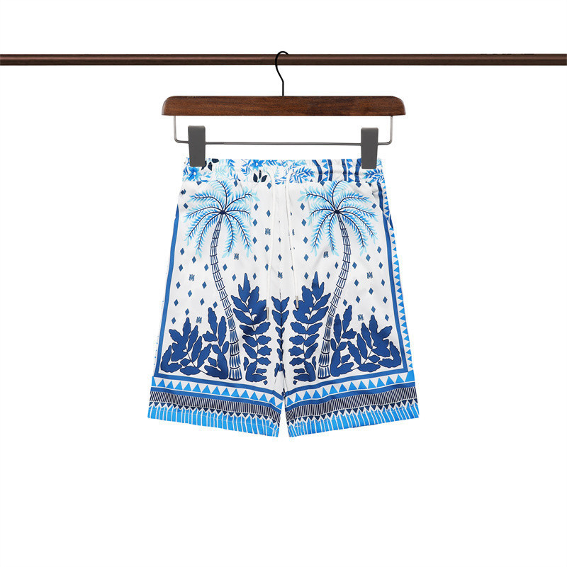 Amiri的新時尚潮流搭配經典椰子樹印花藍色短褲mhsre