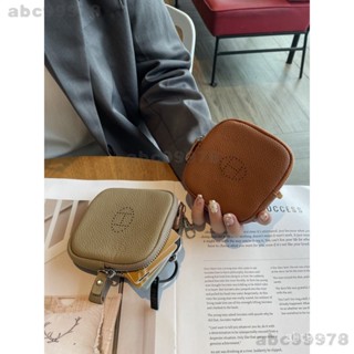 abc99978 新款簡約輕便高顔值耳機包真皮零錢包女士高檔硬幣包時尚卡包