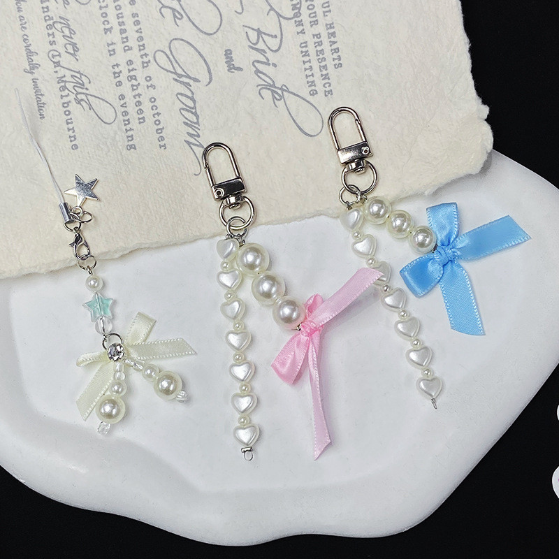 新款甜酷風珍珠蝴蝶結珠鏈鑰匙扣掛件個性手機掛鏈耳機套包包裝飾