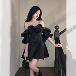 洋裝 氣質洋裝 時尚洋裝 法式一字領黑色蝴蝶結吊帶洋裝女夏高級感小眾設計小個子小黑裙