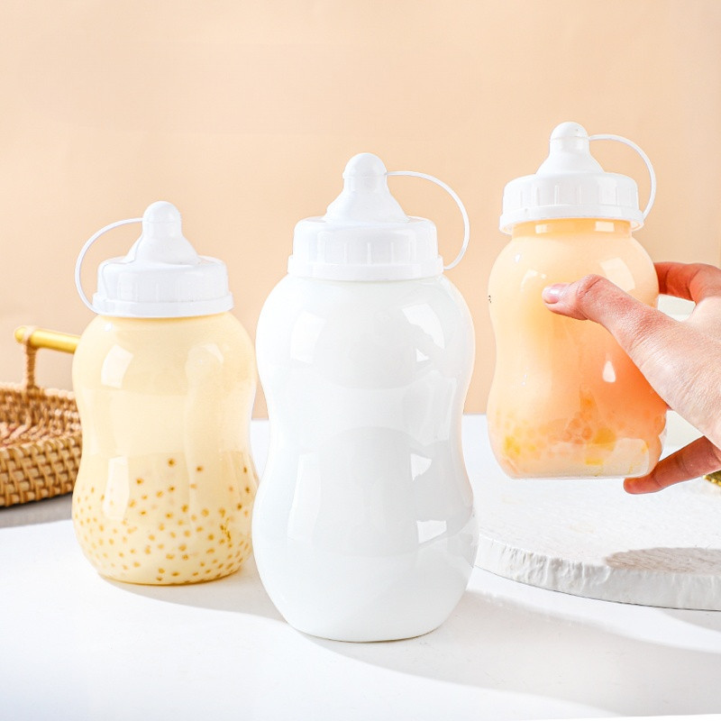 現貨【飲料瓶】一次性網紅塑膠果汁杯 奶茶杯 可愛杯子 寶寶杯 奶嘴瓶 透明 食品級PET