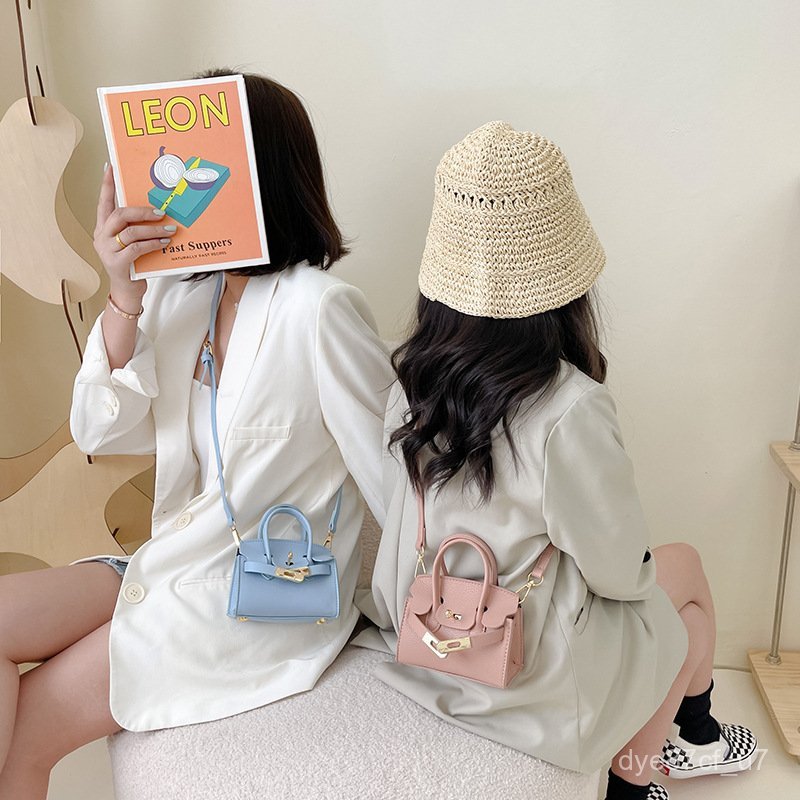 喵咪咪童裝【免運+全店促銷】兒童斜挎親子包包女童小女孩手提時尚潮童潮包洋氣紅色綠色粉色 兒童包包 兒童斜背包
