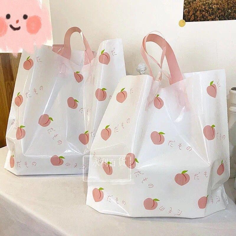 精選🥇服裝店袋子手提塑料袋夏日水蜜桃清新誘惑塑料購物袋化妝品袋包郵GMPIAGH