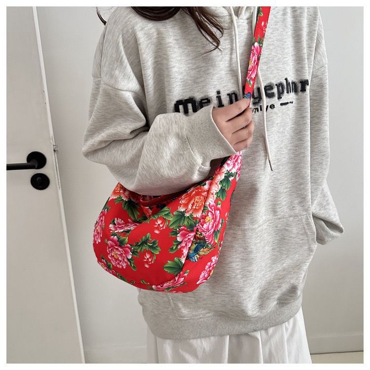 桃園出貨帆布包包女2025新款東北大花小衆秋冬大容量百搭單肩斜挎包餃子包