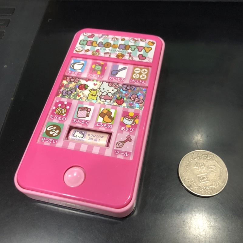 日本 二手 hello kitty 凱蒂貓 手機 造型 玩具 類似 拉霸機 按鈕 隨機 轉動