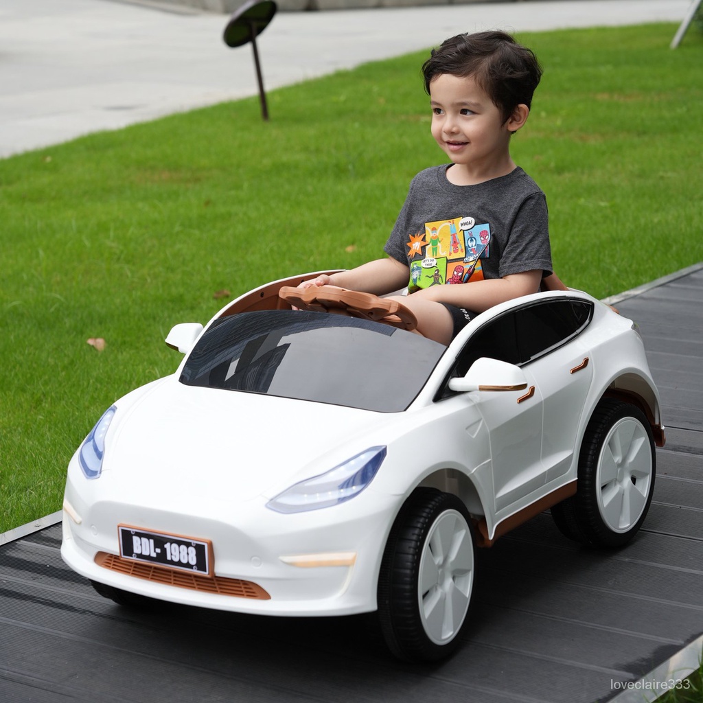 KNOV 特斯拉兒童電動車小孩四輪遙控汽車男女寶寶可坐人四䮠玩具電瓶車