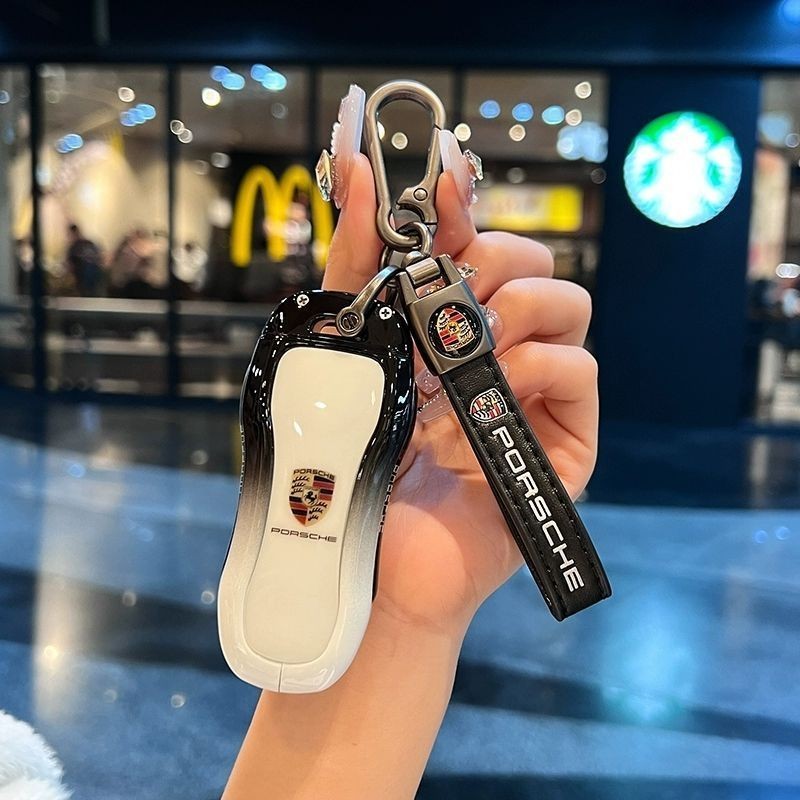 鑰匙套 適用於保時捷鑰匙套  Macan卡宴911 新帕拉梅拉 718taycan金屬男女殻