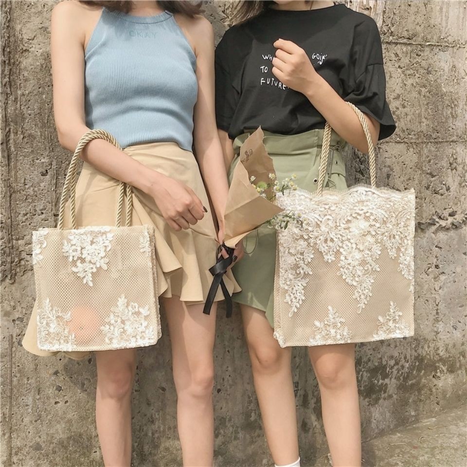 韓國小眾設計蕾絲包包女新款仙女手提單肩包夏天沙灘包購物袋