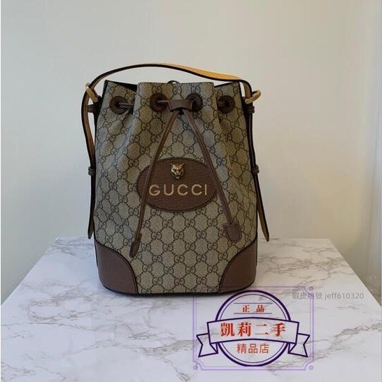 【凱莉二手】GUCCI 古馳 473875 GG Supreme 兩用背包 水桶包 PVC 防水布 虎頭 復古款