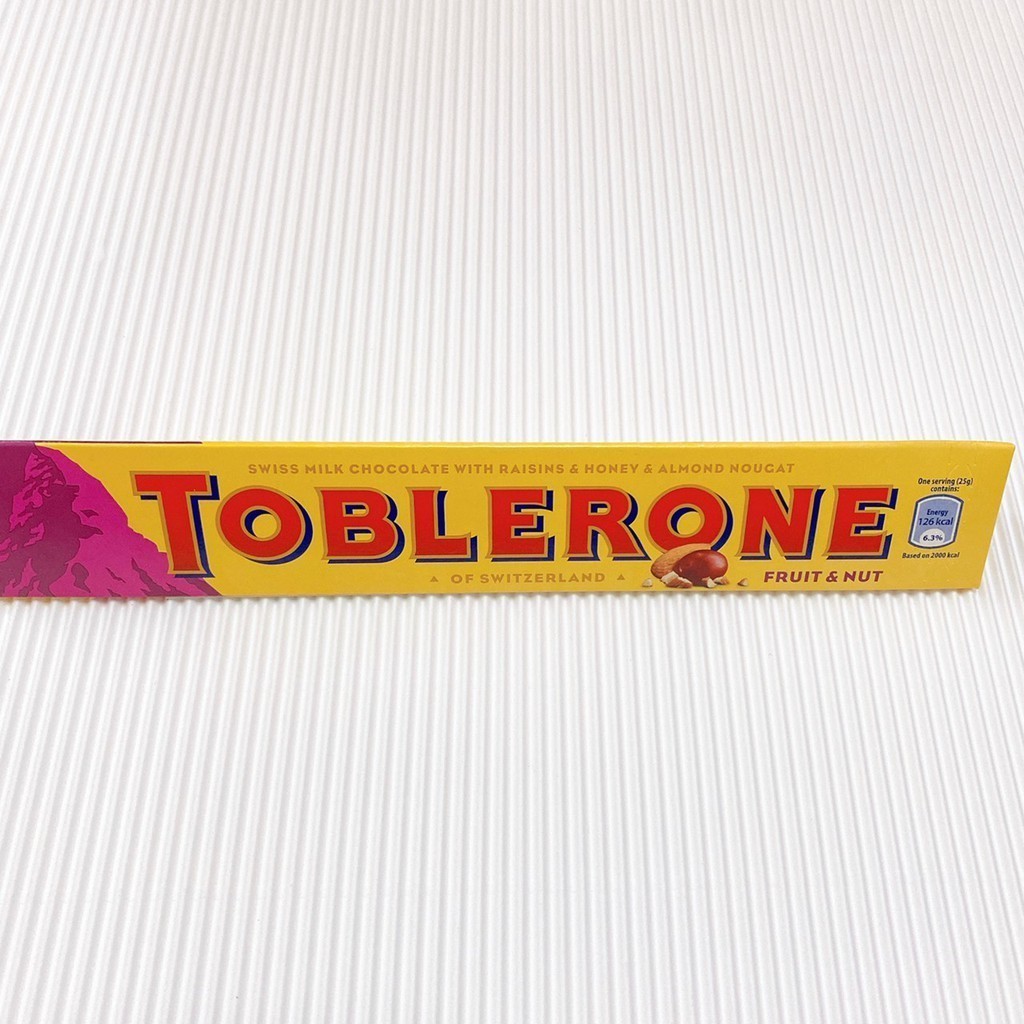 瑞士三角牛奶巧克力 TOBLERONE  (含葡萄乾及蜂蜜及奶油杏仁) 100g