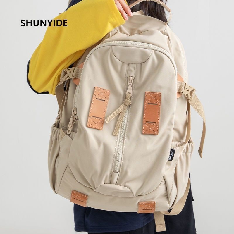 SHUNYIDE2022新款雙肩包女防潑水書包男電腦背包旅行包休閑運動包【小筆精品】
