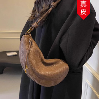 免運 真皮餃子包女2025新款高階小眾設計感韓國包包 斜挎月牙包 牛皮質感 軟皮 牛角包 斜揹包 水餃包 半月包 側揹包