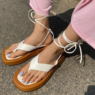 七喜服裝～綁帶涼鞋女 夏季新款夾趾夾腳拖厚底鬆糕鞋復古抽繩羅馬沙灘鞋