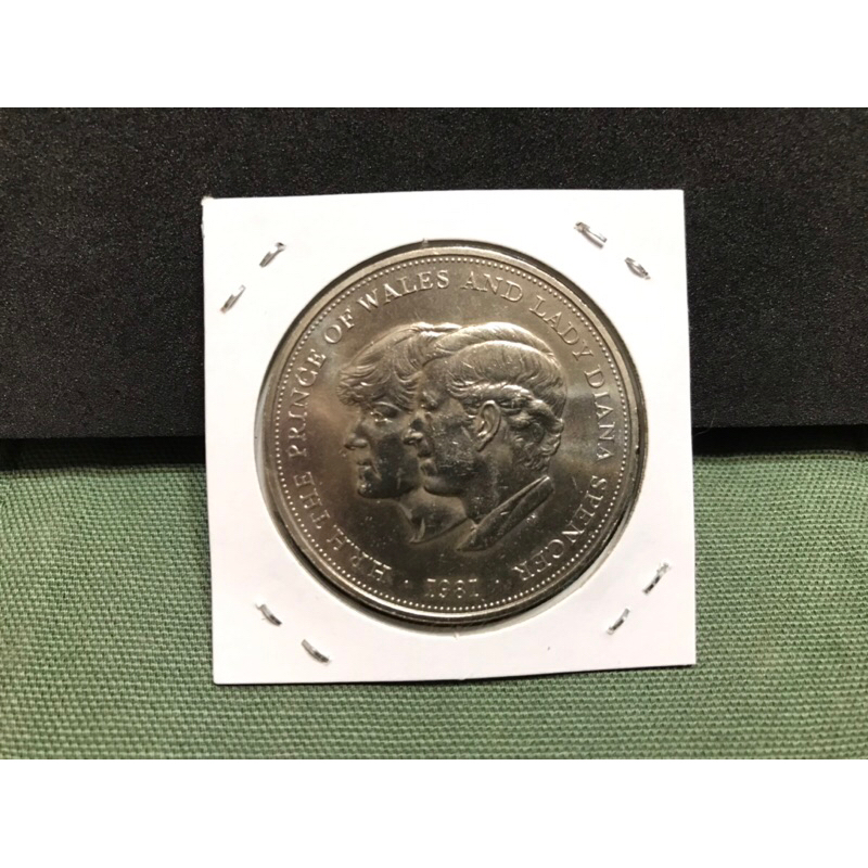 英國🇬🇧硬幣-1981年「皇室婚禮💒-查理王子·黛安娜王妃」紀念幣（紙夾）