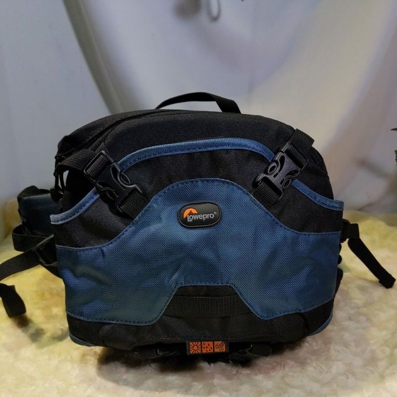 【LOWEPRO】羅普 英武士腰包Inverse 100 AW
 專業相機後背包(北極藍色)，有隱藏的雨罩及水壺袋