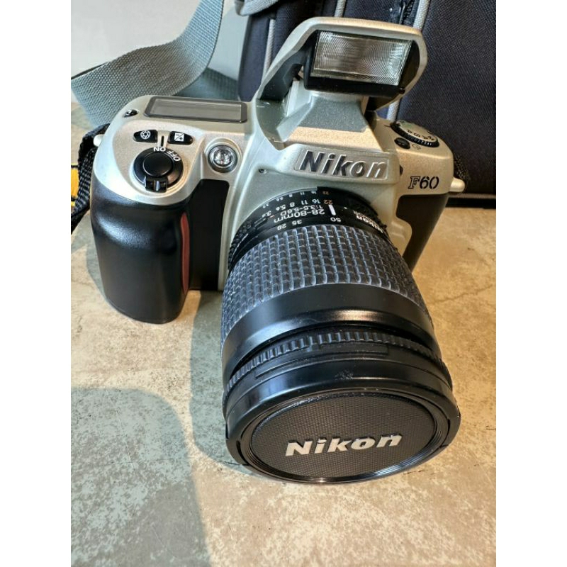 NIKON F60 日本製單眼底片相機含日本製Nikon28-80mm 鏡頭不含電池 鏡頭都正常 ，無直接裝底片拍洗過。
