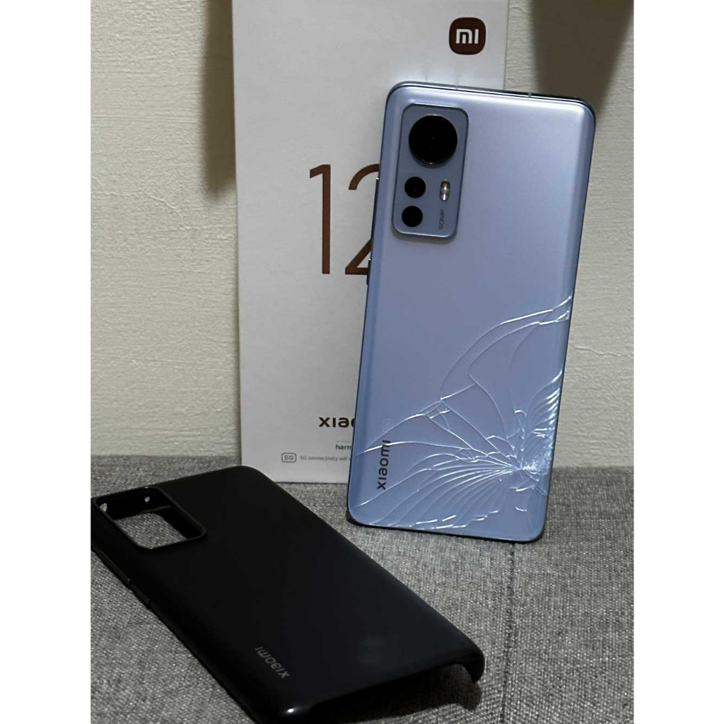 小米XIAOMI 12 盒裝完整 (原廠標配+原廠保護殼)背蓋有裂