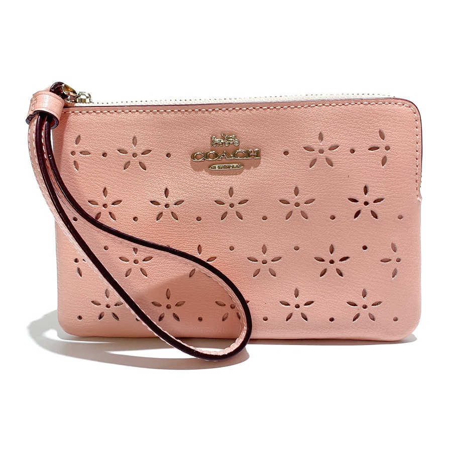 COACH 粉色簍空雕花設計皮革材質手拿包 #67608